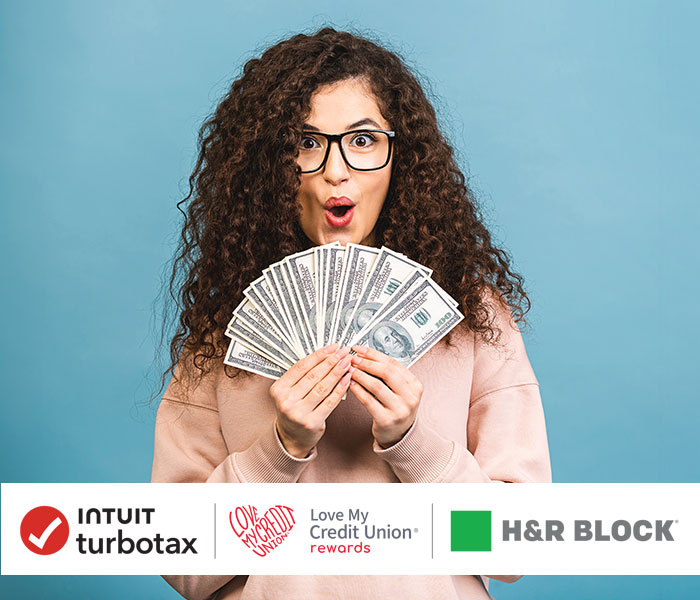 Woman with black framed glasses and long curly hair smiling with a fan of money above the Intuit Turbotax,  H&R Block, and Love My Credit Union Rewards logos