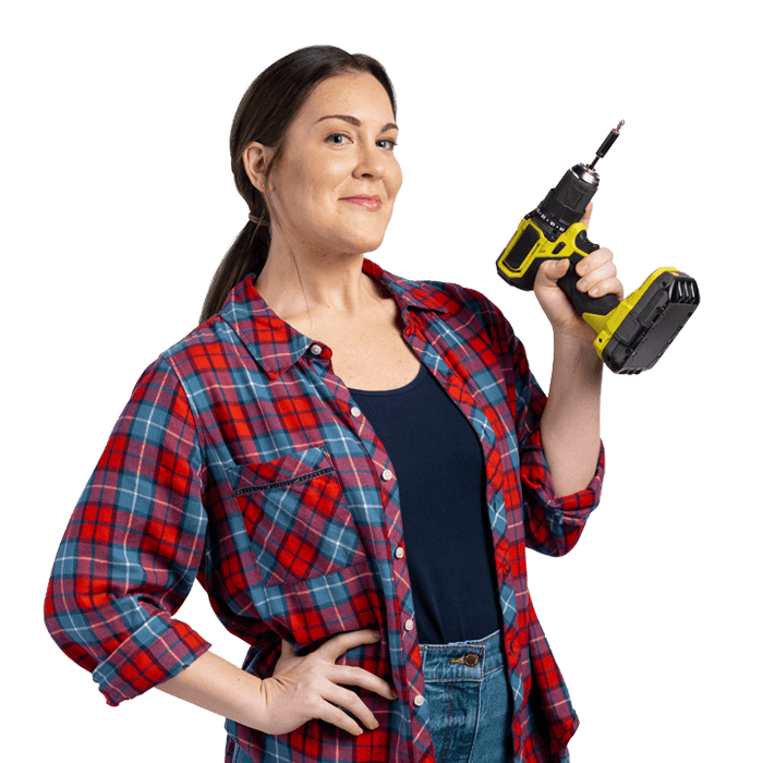 Woman in plaid flannel holding screwdriver